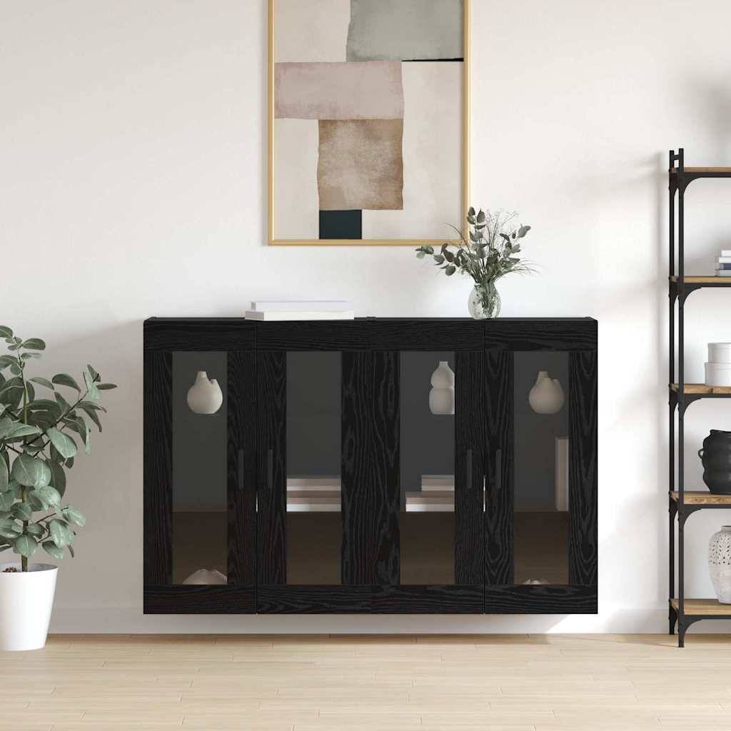 Zeitgenössisches Wohnzimmer mit einem Holzschrank aus dunklem Holz mit Glastüren. Ein modernes abstraktes Gemälde hängt darüber, daneben eine Pflanze auf einem Regal.