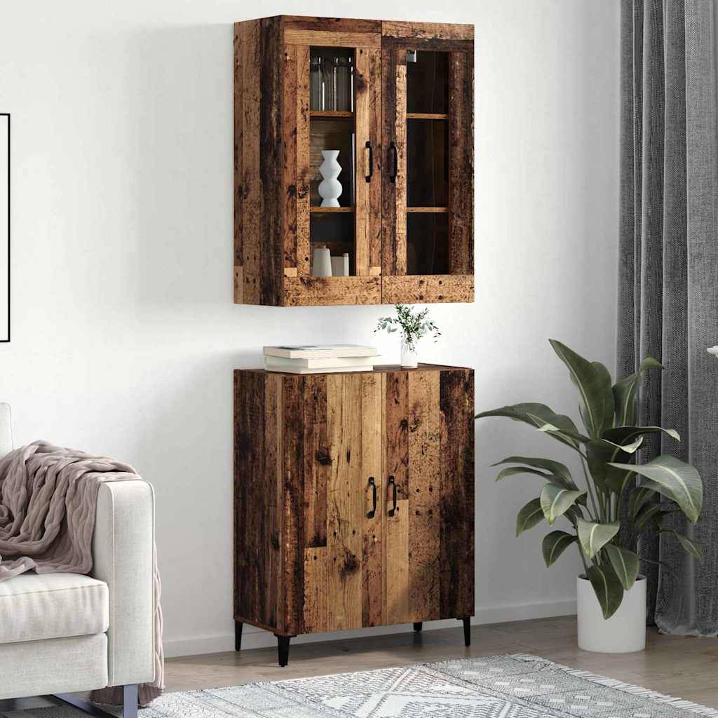 Eine gemütliche Ecke des Wohnzimmers zeigt rustikale Holzschränke, einer an der Wand und einer am Boden mit einer Pflanze daneben, in der Nähe eines Sofas.