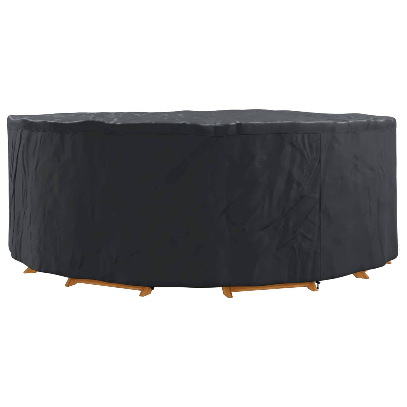 Ein rundes Terrassentisch ist vollständig mit einer schwarzen, wetterfesten Abdeckung bedeckt.
