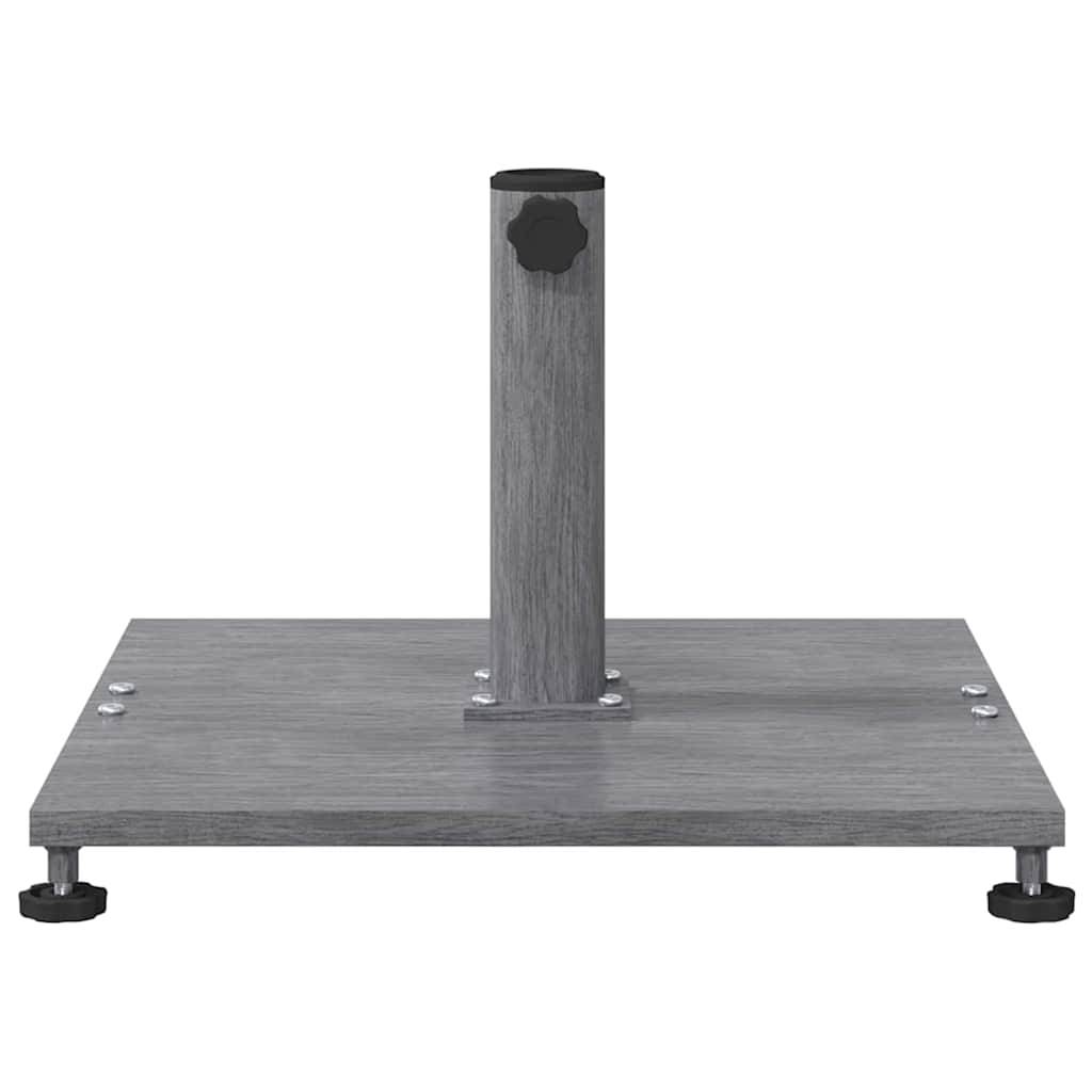 Ein Metallfuß mit einer zentralen vertikalen Stange und verstellbaren Füßen, der für Montagezwecke verwendet wird.