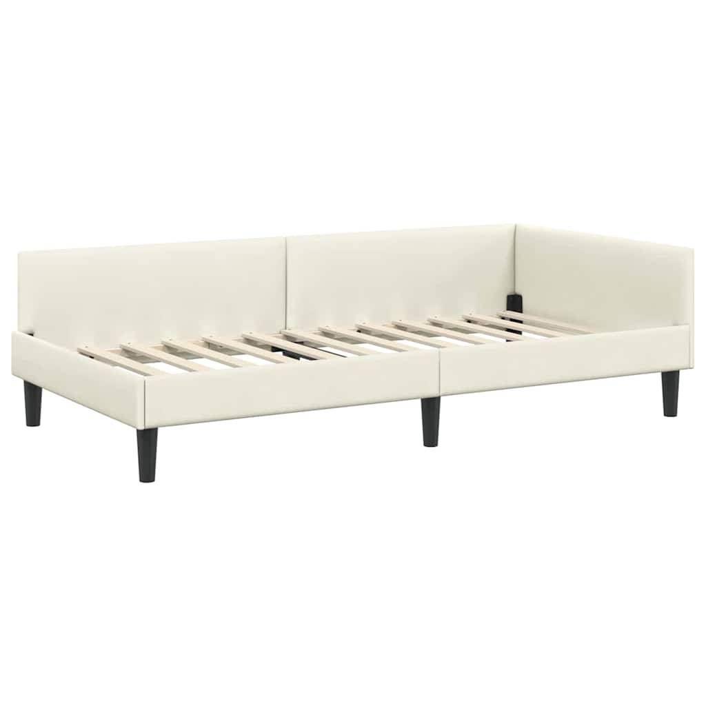 Ein weißes, gepolstertes Tagesbett mit einer Holzlattenrost-Basis und schwarzen Beinen, geeignet für eine moderne Wohnzimmer- oder Gästesoziusausstattung.