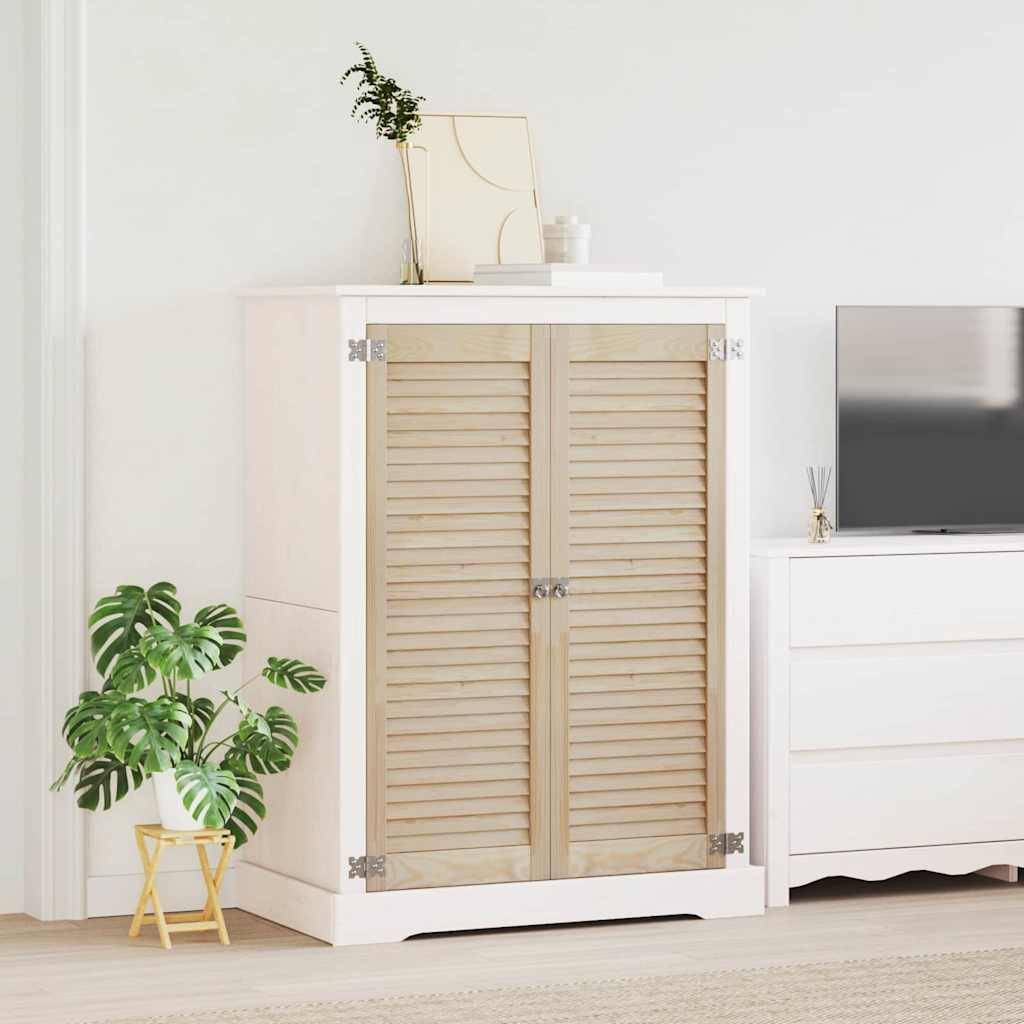 Eine gemütliche Ecke des Wohnzimmers mit einem Holzschrank mit Lamellen, einem weißen Sideboard mit einem Fernseher, einem Spiegel und einer Topfpflanze auf dem Boden.