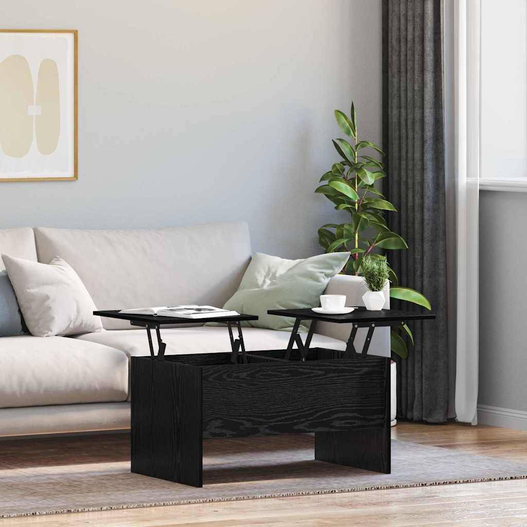 Ein modernes Wohnzimmer präsentiert ein hellgefärbtes Sofa, einen dunklen Couchtisch mit Klappdeckeln, grüne Kissen, eine Topfpflanze und abstrakte Wandkunst.