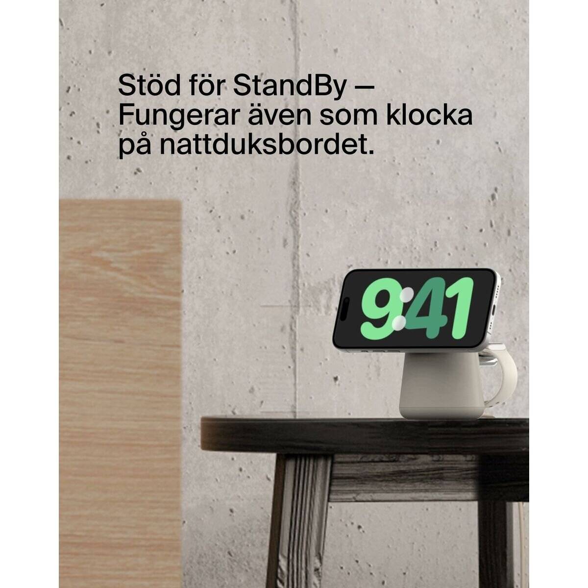Telefon auf einem Nachttisch zeigt 9:41 und veranschaulicht den StandBy-Modus als Nachtuhr.