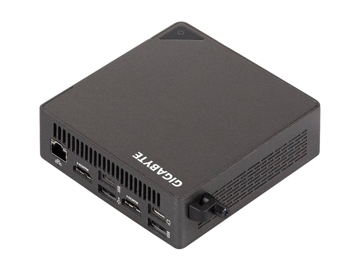 Schwarzer GIGABYTE Mini-PC-Würfel mit USB-Anschlüssen an der Vorderseite, Kartensteckplatz und Ein-/Aus-Schalter auf weißem Hintergrund.