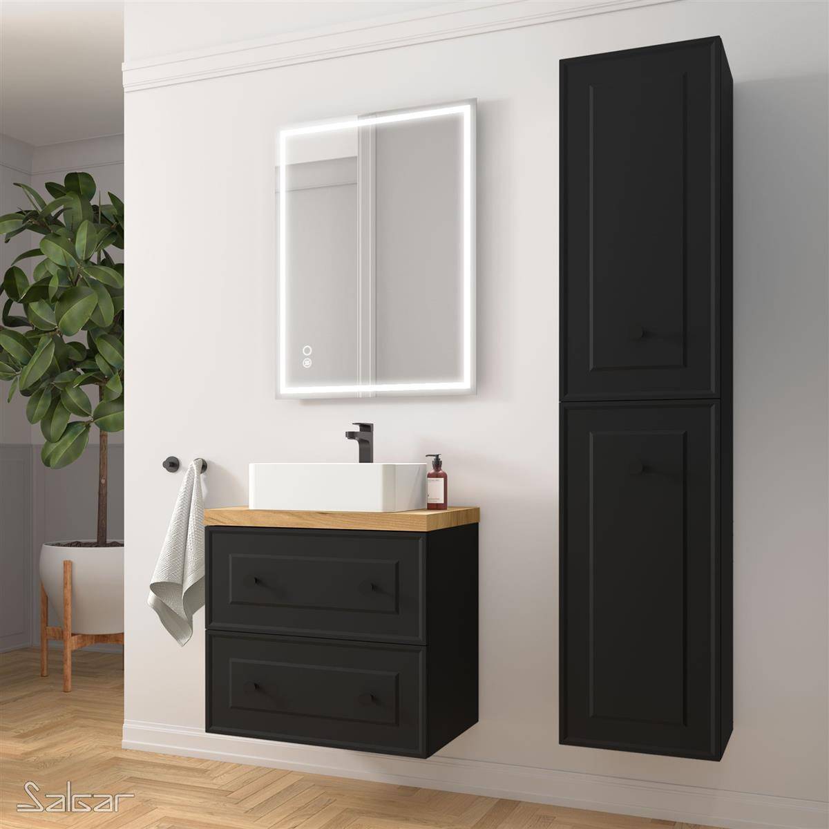 Modernes Badezimmer-Waschtisch mit schwarzem Unterschrank, Aufsatzwaschbecken, beleuchtetem Spiegel und passendem Hängeschrank in einem hellen Raum mit Holzboden.