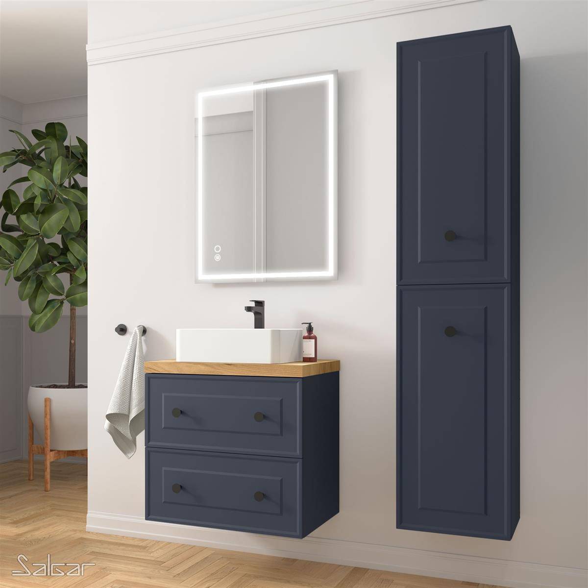 Modernes Badezimmerwaschtisch mit Wandspiegel, schwarzem Spülenmischbatterie, Handtuchring und hohem dunkelblauen Schrank neben einer Topfpflanze.
