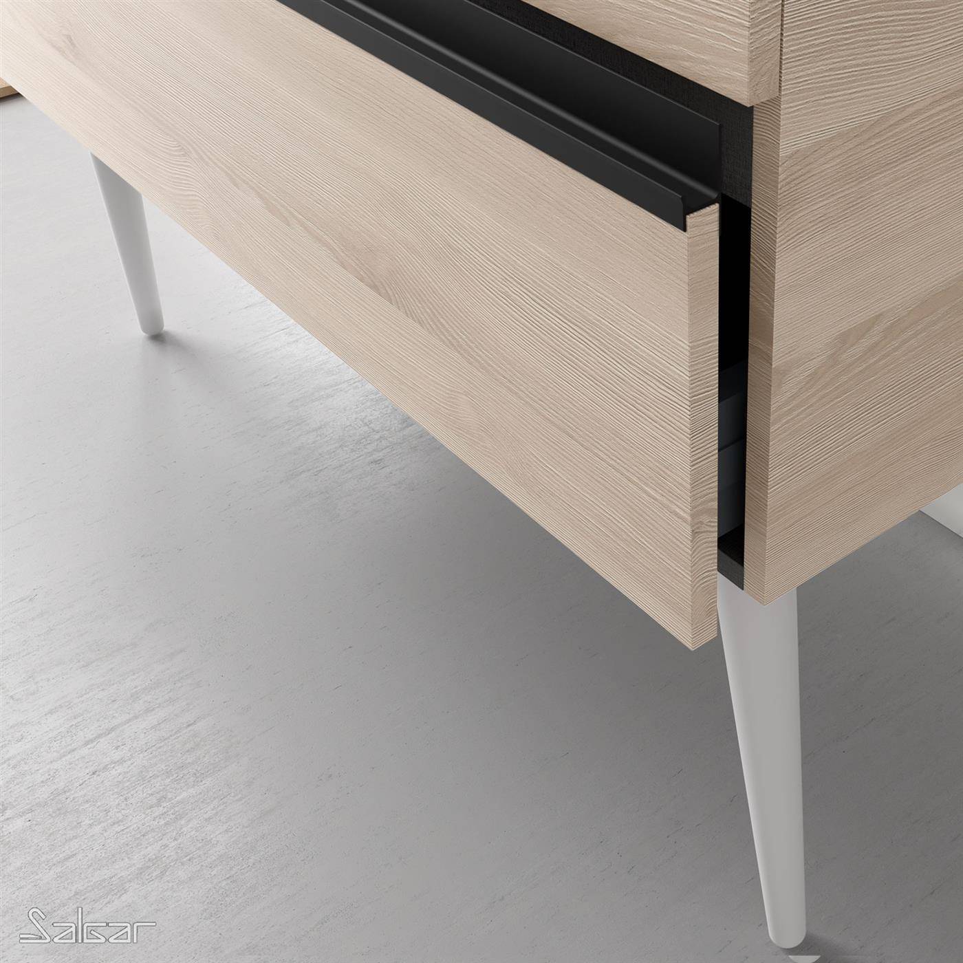 Nahaufnahme eines hellholzschranks mit teilweise geöffnetem frontpanel, schwarzem rahmen und konischen weißen beinen auf grauem boden.