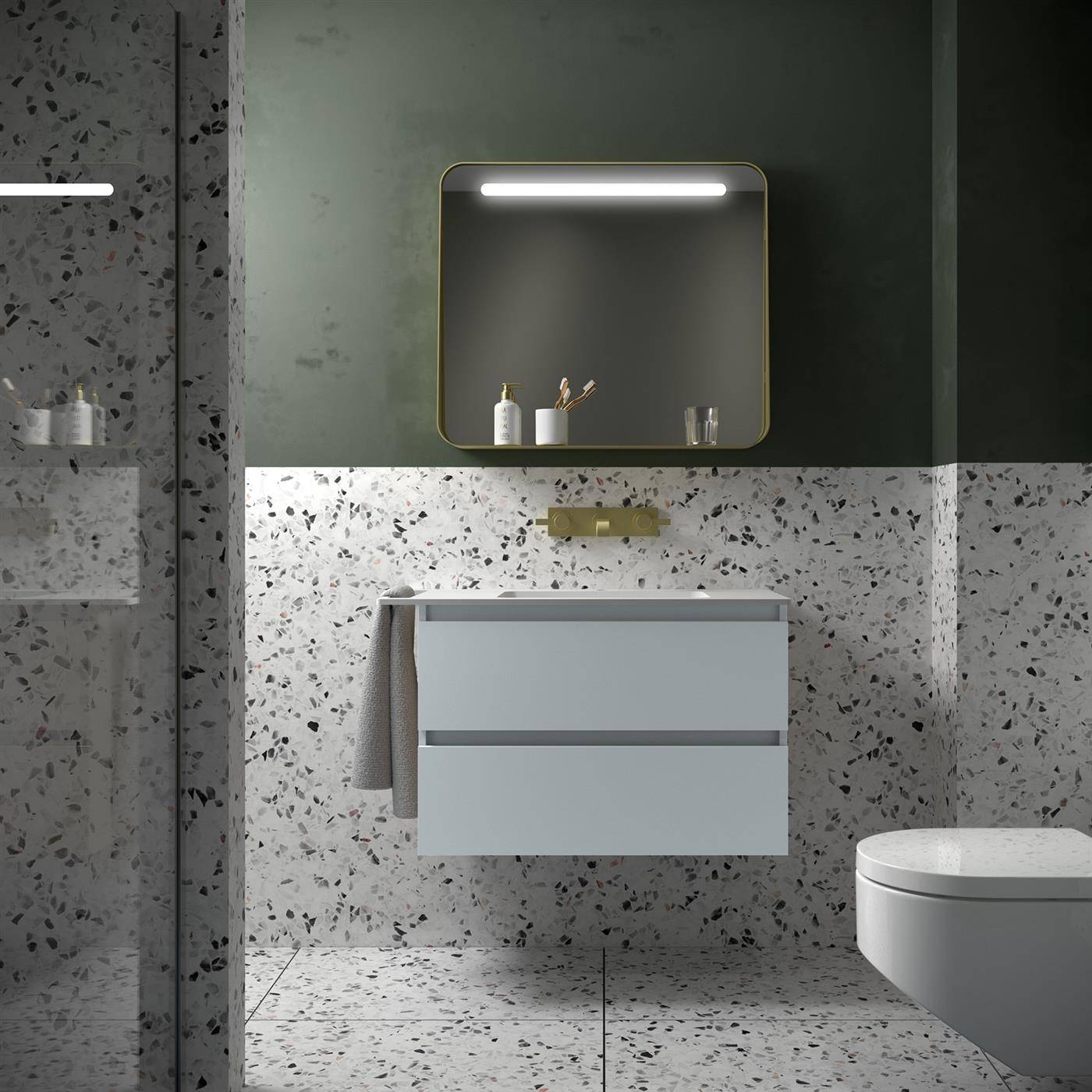 Modernes Badezimmer mit schwebendem Doppelschubladenwaschtisch, rundem Spiegel, Wandleuchte, Terrazzo-Wänden und -Boden sowie einer wandmontierten Toilette.