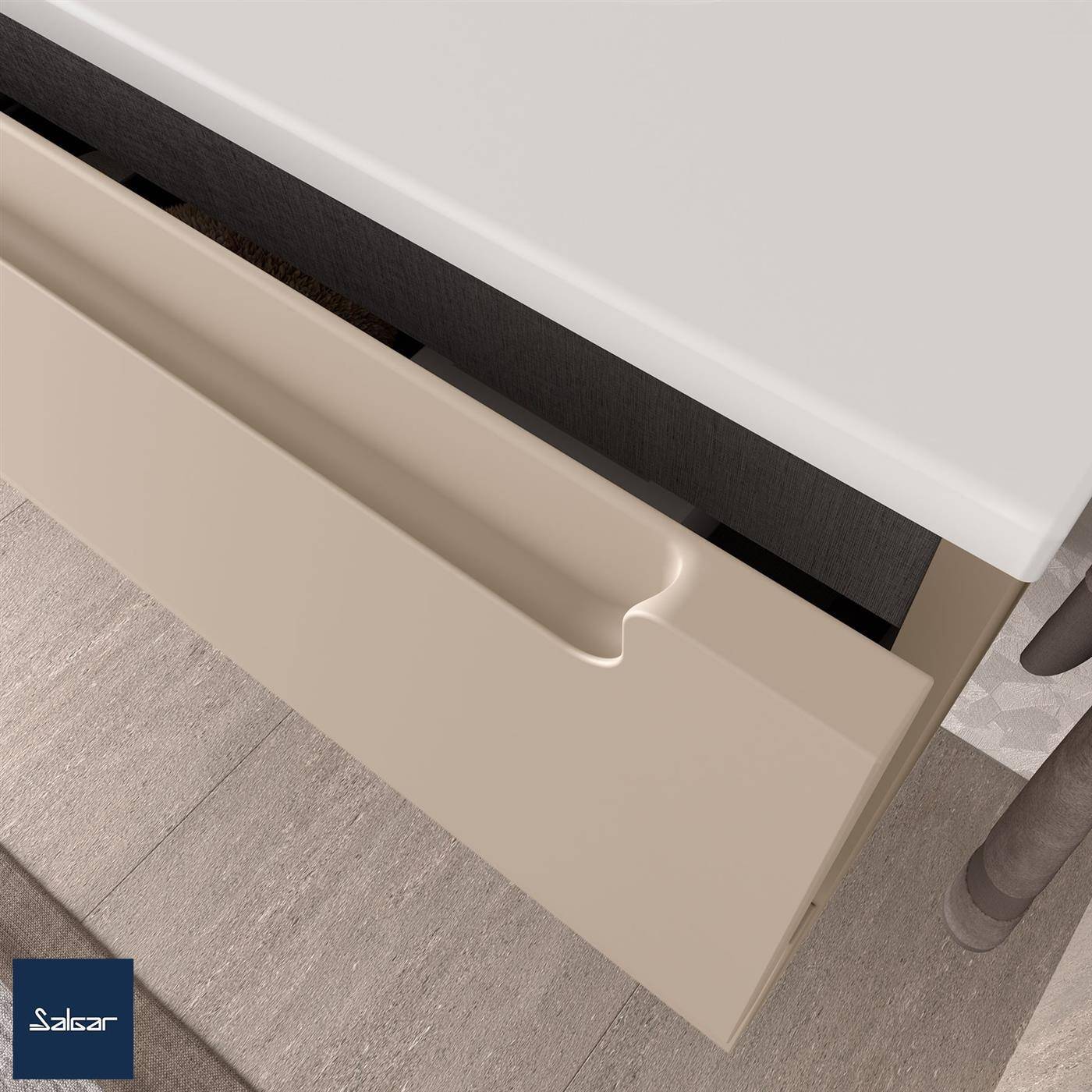 Nahaufnahme einer beigen Schublade, die leicht unter einer weißen Arbeitsplatte geöffnet ist und ein elegantes, griffloses Küchendesign zeigt.
