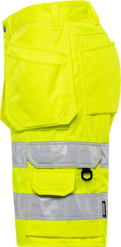 Eine Nahaufnahme von gelber Warnschutzkleidung mit einem reflektierenden Streifen darüber.