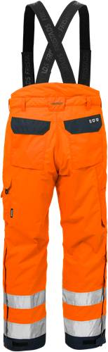 Helle orange Hose mit schwarzen Akzenten, mit mehreren Taschen und verstärkten Nähten, was auf Haltbarkeit für Arbeit oder Outdoor-Aktivitäten hindeutet.