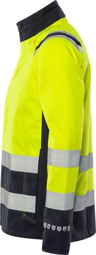Eine Person, die von der Seite gezeigt wird und einen hellen gelben Warnschutzjacke mit reflektierenden Streifen trägt.
