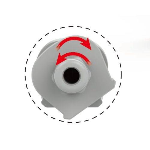 Draufsicht einer grauen mechanischen Pumpe oder eines Ventils mit roten gekrümmten Pfeilen, die Rotationsbewegung anzeigen, umgeben von einer gestrichelten kreisförmigen Kontur.