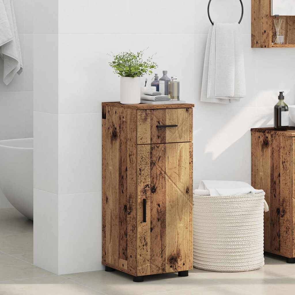 Ein minimalistisches Badezimmer mit Holzschränken, einer Topfpflanze, Toilettenartikel und einem Weidenkorb vor einer weißen gefliesten Wand.