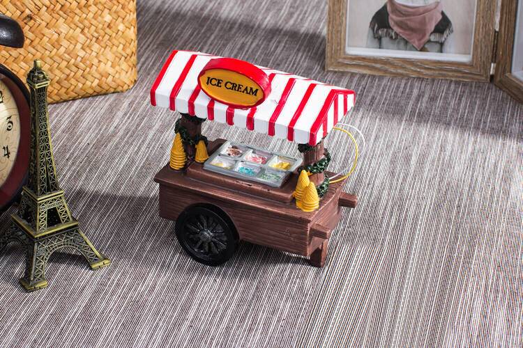 LED Universum LED Deko mobiler Eisladen Liebevolle beleuchtete Dekoration im Eisverkäufer-Look Batteriebetrieben