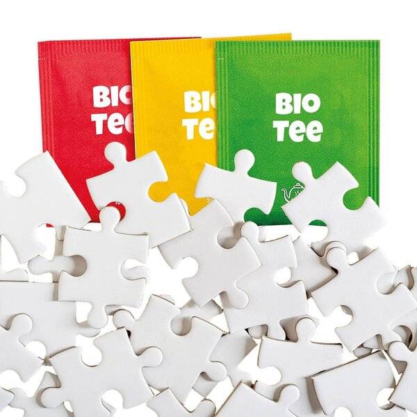 Adventskalender 'Puzzle u. Bio-Tee-Adventskalender Motiv Eislaufen' bestückt