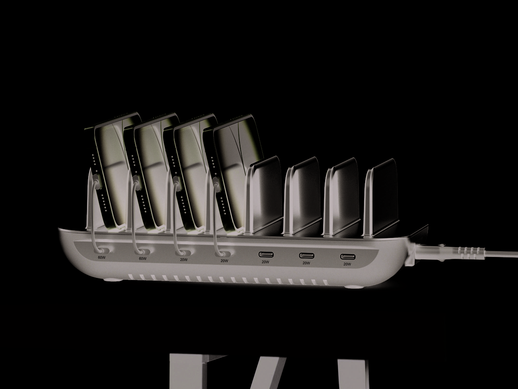 Ladedock mit acht Smartphones, vier violetten Telefonen und vier schwarzen Telefonen, in eine Stromquelle auf einem Tisch eingesteckt.