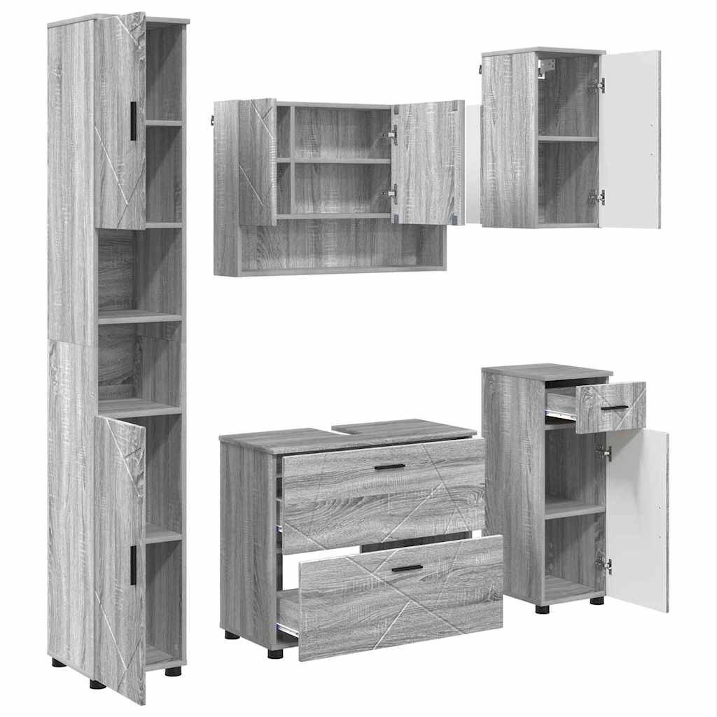 Verschiedene graue Holz-Aufbewahrungseinheiten, darunter ein hohes Schränkchen, ein wandmontierter Schrank, eine Kommode mit zwei Schubladen und ein quadratischer Schrank mit geöffneten Türen.