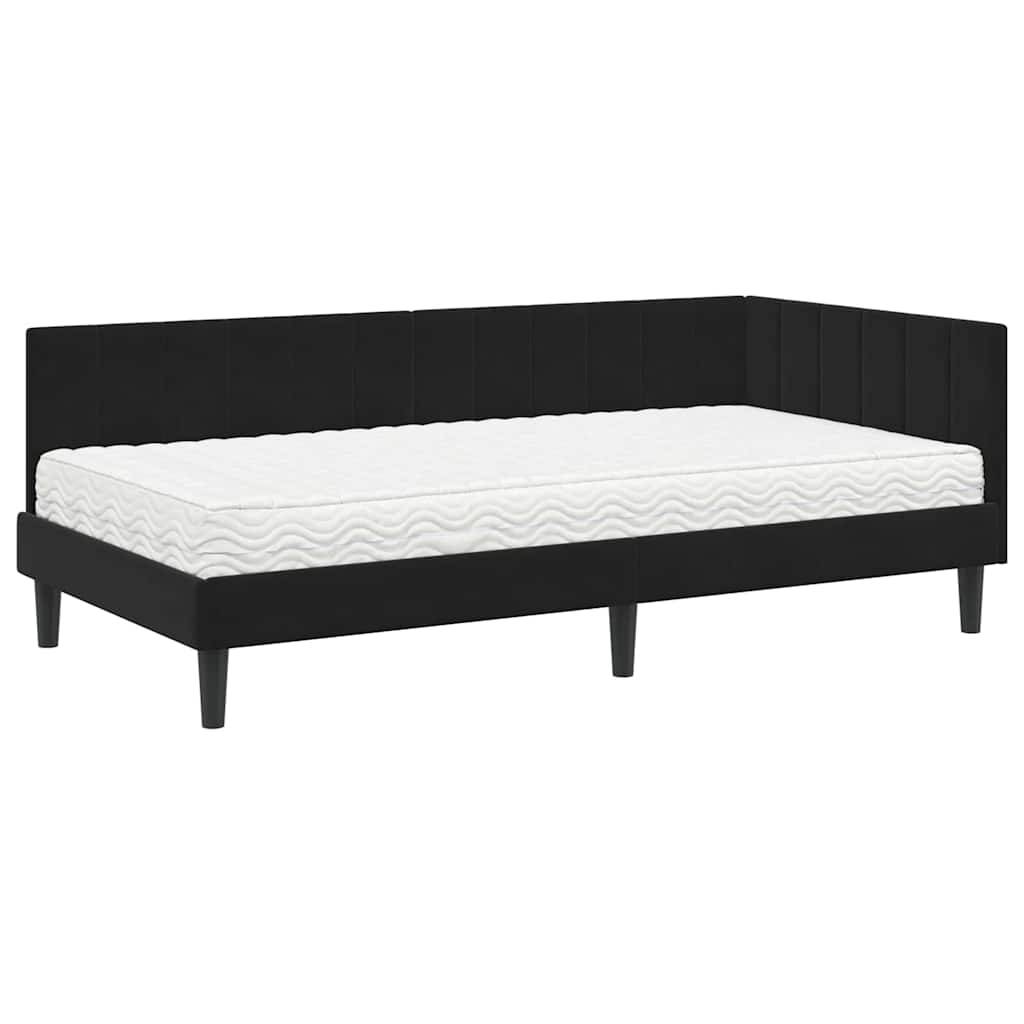 Ein schwarzes, modernes Tagesbett mit einer weißen Matratze, das ein klares, geometrisches Design aufweist und sich perfekt in einen zeitgenössischen Wohnbereich einfügt.