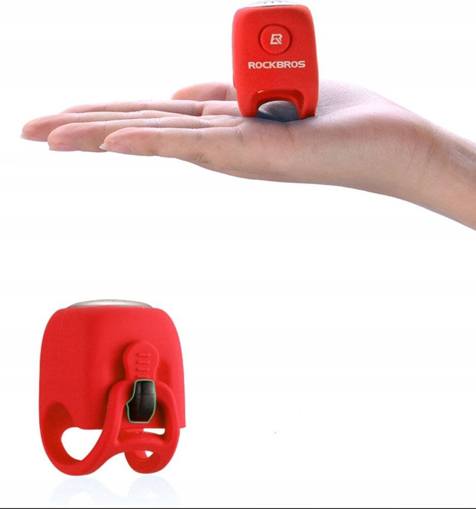 Ein kleines rotes 'Rockbros'-Fahrradlicht ruht auf einer ausgestreckten Hand und zeigt sein kompaktes, tragbares Design. Eine weitere Ansicht zeigt den hinteren Haken.