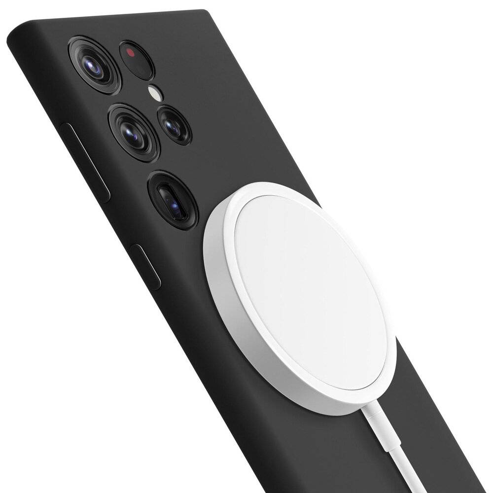 Ein schlankes schwarzes Smartphone wird gezeigt, an dessen Rückseite ein kreisförmiges weißes Ladegerät angebracht ist, das die kabellose Ladefähigkeit anzeigt.