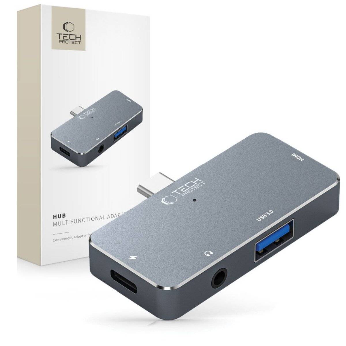 Ein silberner multifunktionaler Adapter mit USB 3.0 und 3,5-mm-Anschlüssen wird neben seiner Verpackung mit dem 