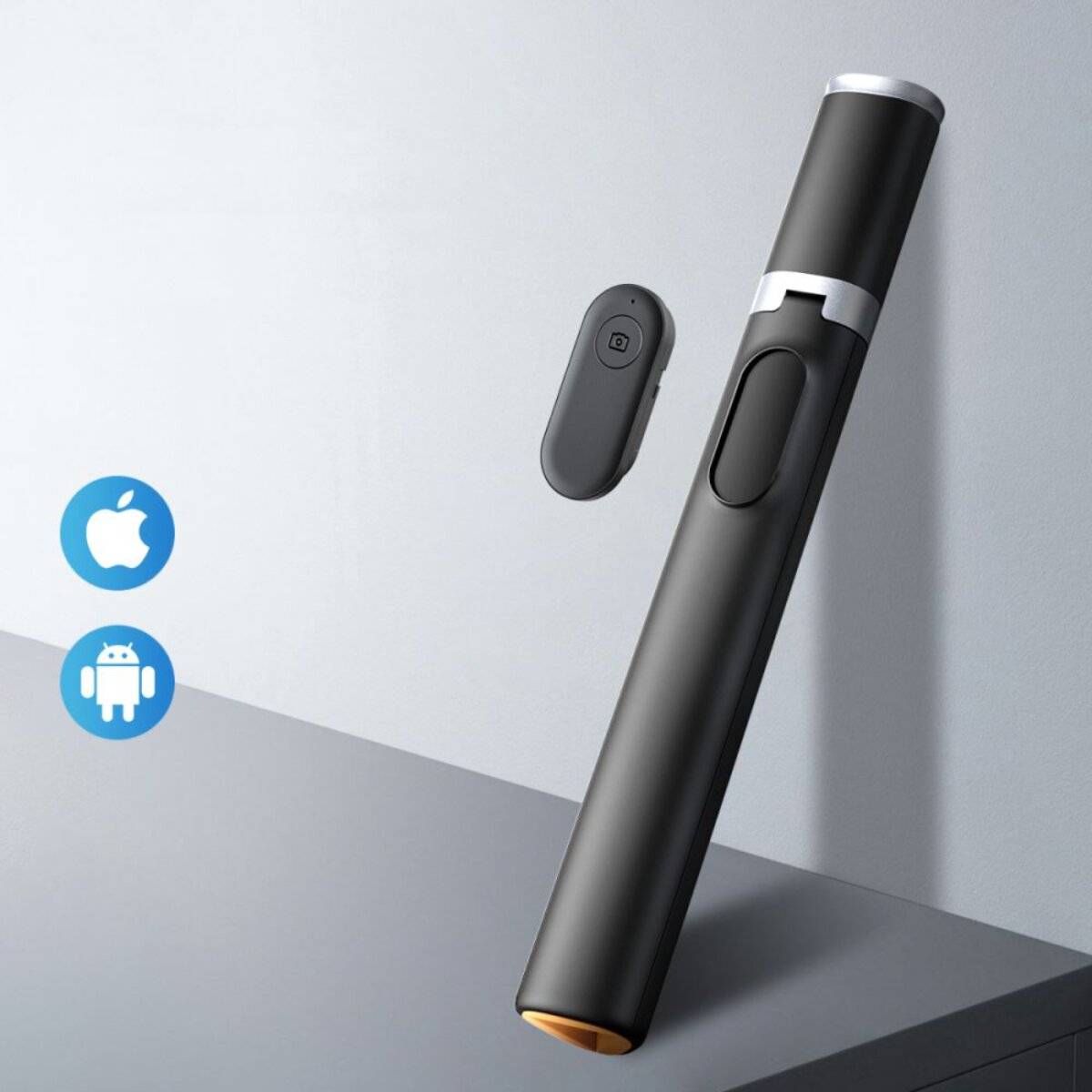 Eine elegante schwarze Bluetooth-Fernbedienung mit abnehmbarem Knopf für Präsentationen, kompatibel mit Apple- und Android-Geräten.