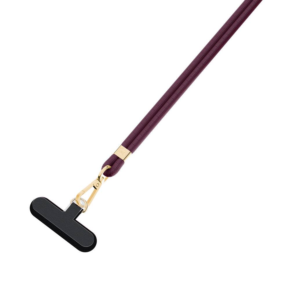 Langer, kastanienbrauner Riemen mit einem schwarzen, T-förmigen Hartschild-Entferner, der an einer Goldspange an einem Ende befestigt ist.