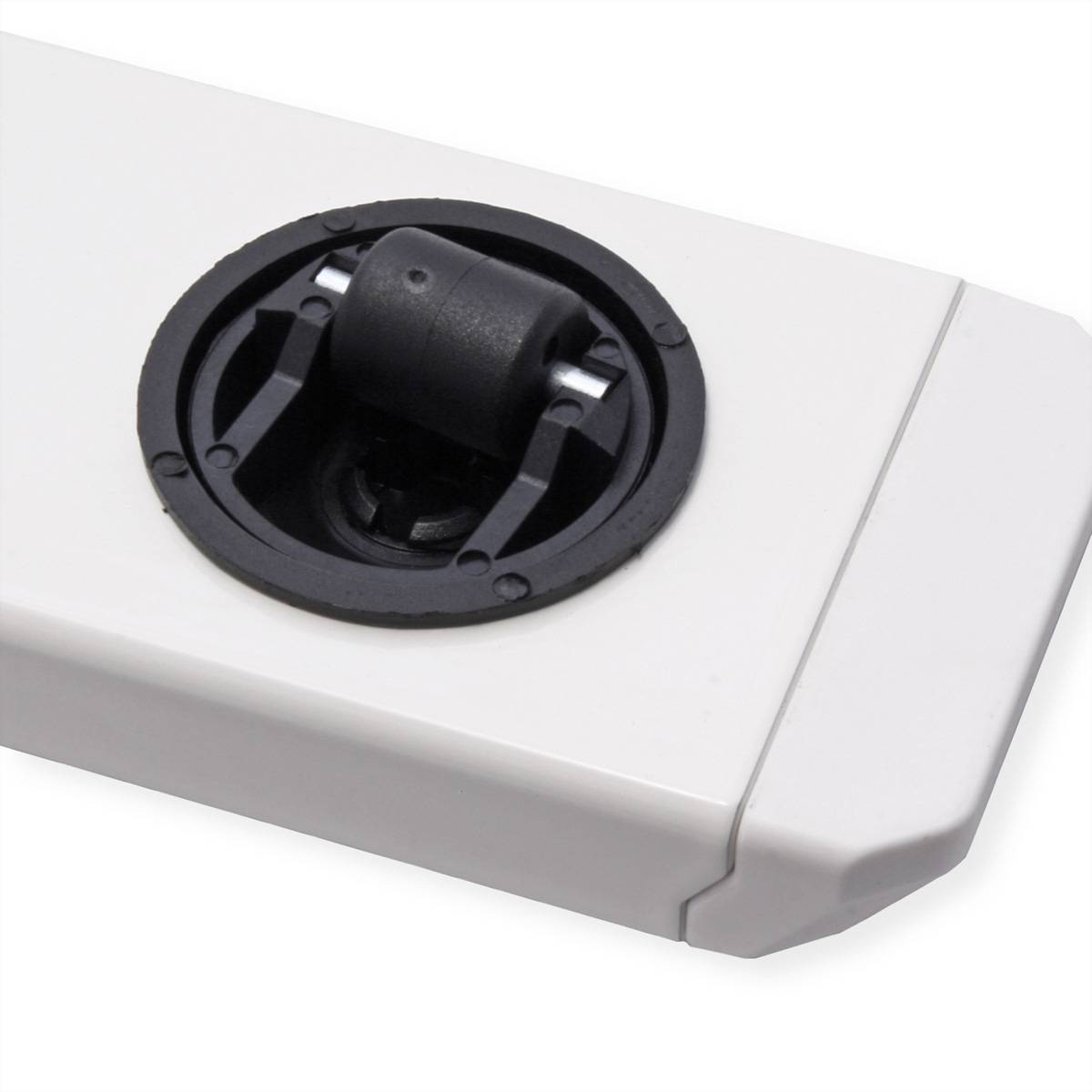 Ein weißes rechteckiges Objekt mit einem schwarzen kreisförmigen Radmechanismus, der in seiner Oberfläche eingebettet ist, möglicherweise Teil eines Möbelbeins oder einer Rolle.