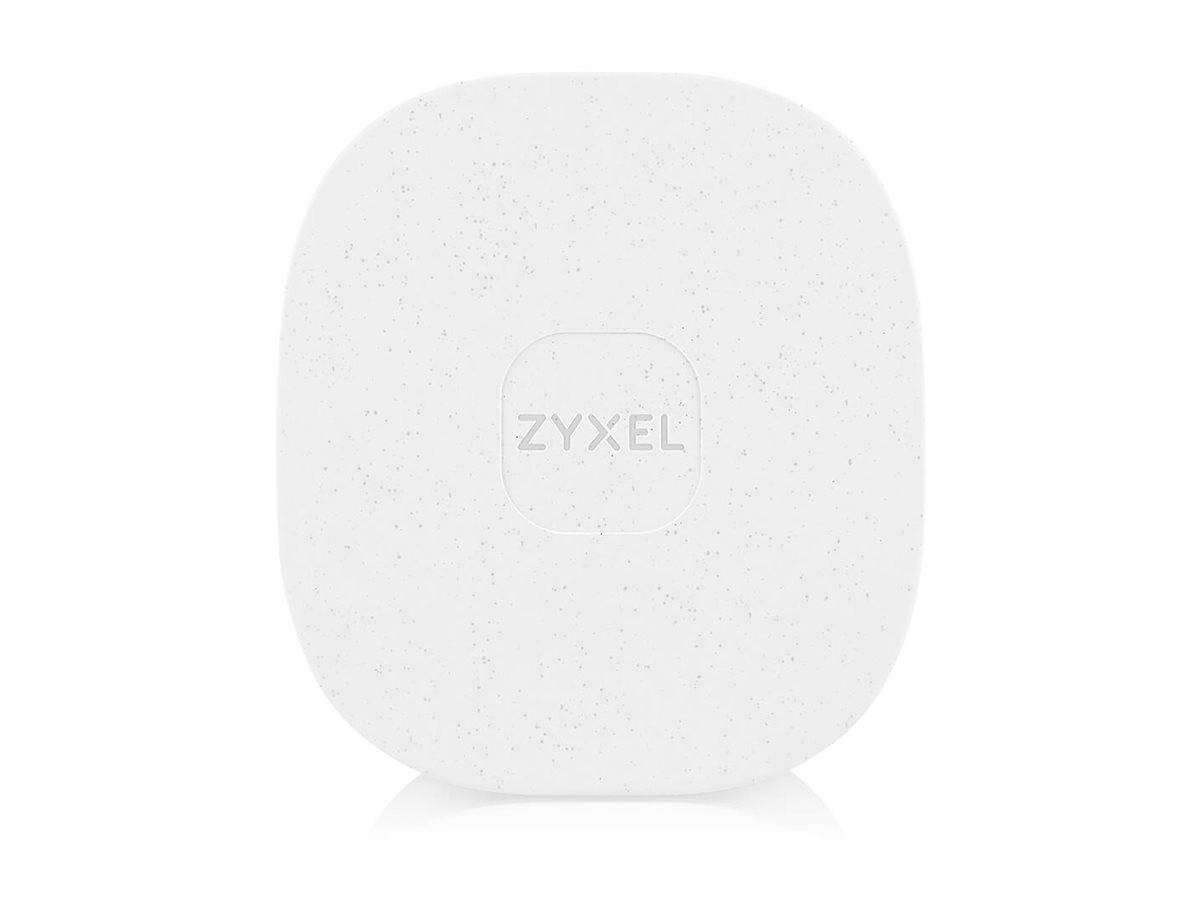 Weißes Quadratgerät mit abgerundeten Kanten und kleinen Flecken der Marke 'Zyxel', wahrscheinlich ein Netzwerk- oder Technologieprodukt.