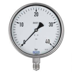 Ein rundes Druckmessgerät zeigt 0 bis 40 bar, wobei die Nadel kurz unter 20 bar liegt. Es ist mit 'EN 837-1' und 'WIKA' beschriftet.