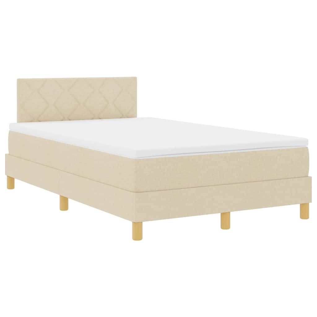 Beige gepolstertes Bett mit gestepptem Kopfteil und Holzbeinen, in einem minimalistischen Stil vor einem schlichten Hintergrund präsentiert.