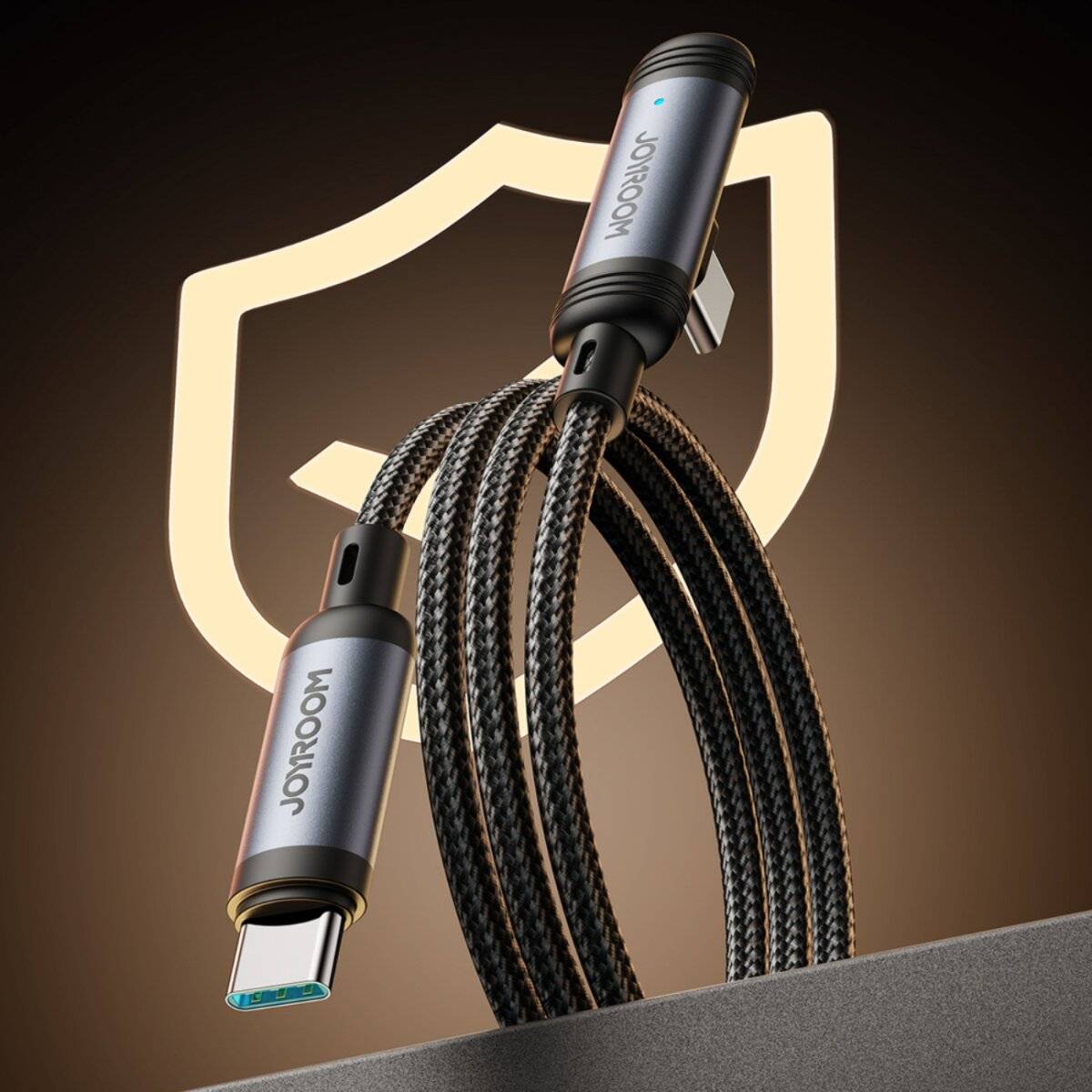 Ein strapazierfähiges geflochtenes Ladekabel für Telefone mit Type-C-Anschlüssen, vor einem Schildsymbol hervorgehoben, was Stärke und Zuverlässigkeit andeutet.
