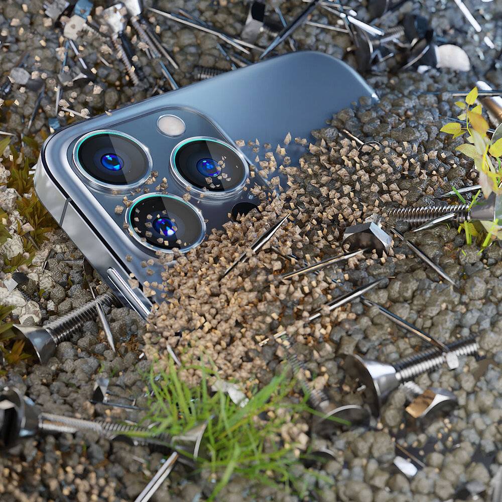 Ein Smartphone, das teilweise in Kies vergraben ist, umgeben von kleinen Schrauben und Nägeln, mit einigen grünen Sprösslingen in der Nähe.
