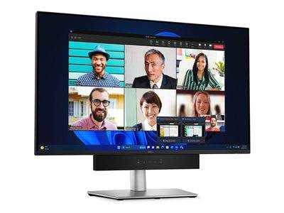 Ein Computermonitor zeigt eine Videokonferenz mit sechs vielfältigen Teilnehmern, die lächeln. Zwei kleine Vorschaufenster zeigen gemeinsam genutzte Dokumente.