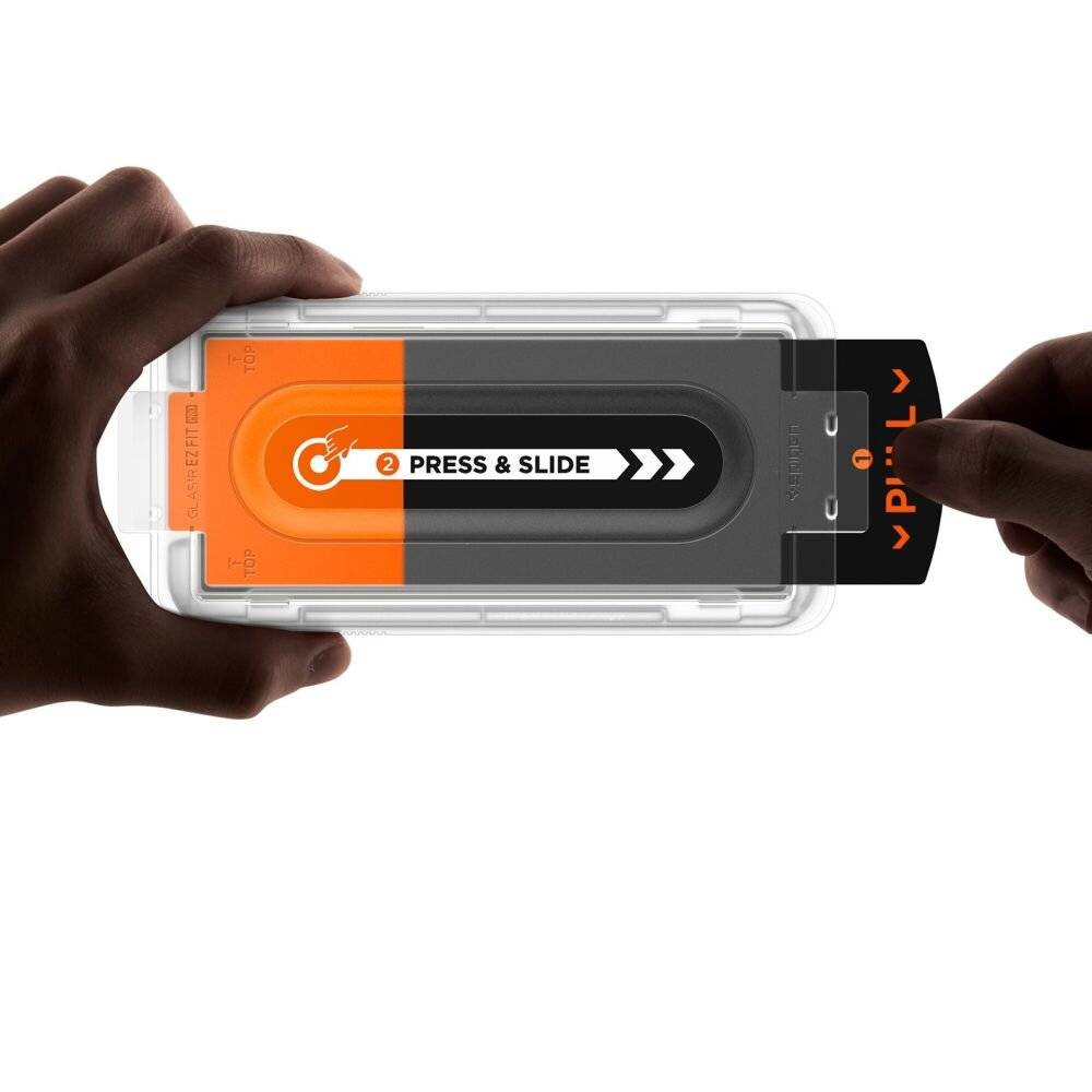 Eine Hand, die ein orange-graues Gerät mit der Aufschrift „Press & Slide