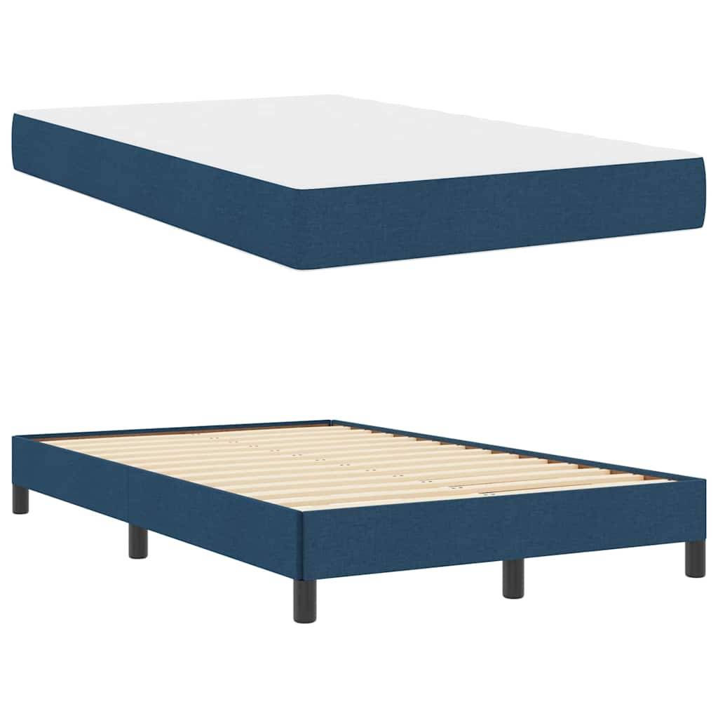Blau-weiße Königin-Plattformbett mit schwarzen Beinen.