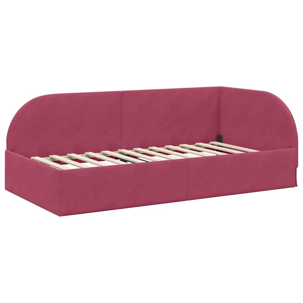 Rosafarbenes Tagesbett-Gestell ohne Matratze, mit modernem Design, geschwungener Rückenlehne und Holzlatten.