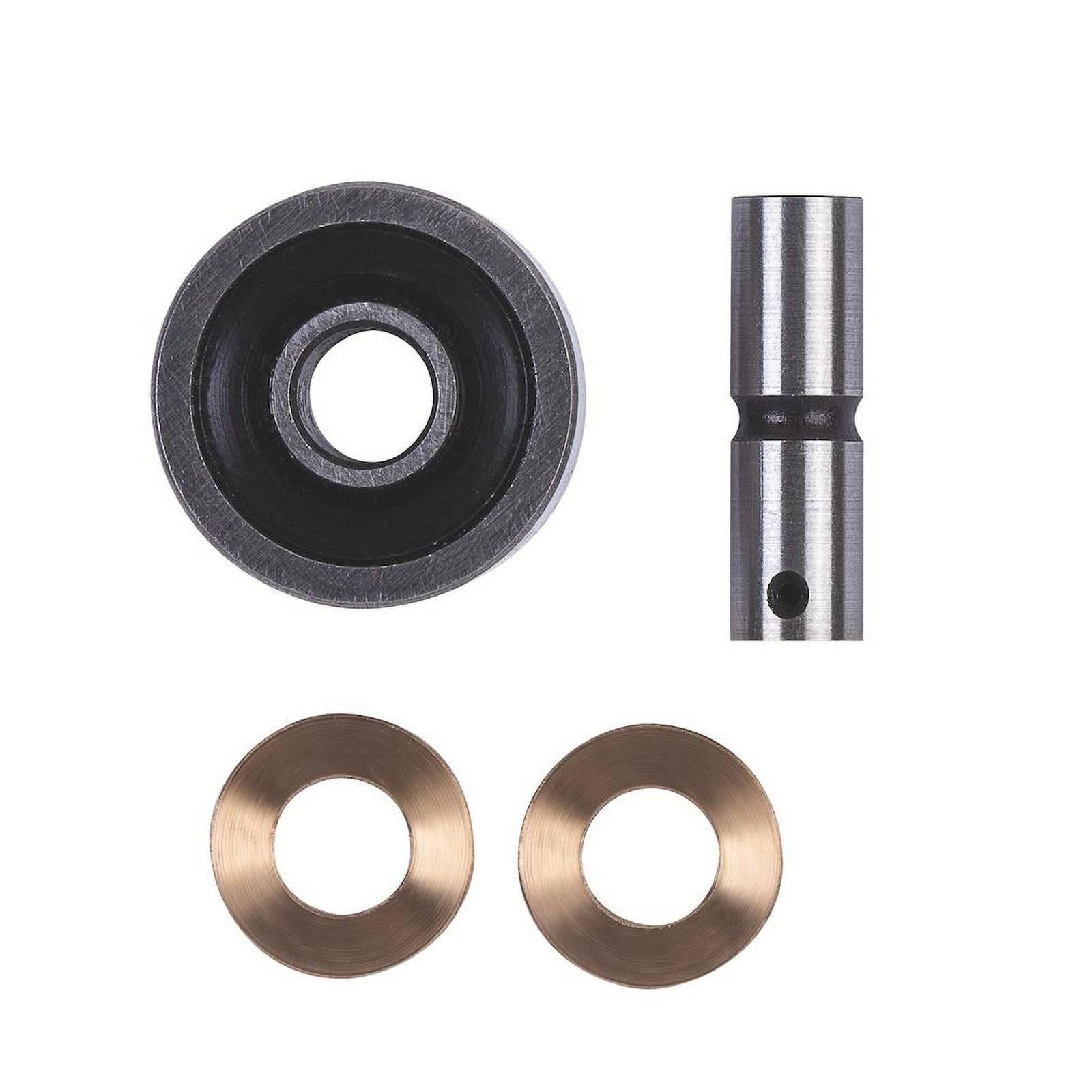 Metallteile einschließlich einer zylindrischen Stange und runder Komponenten, möglicherweise für die Verwendung in mechanischen Montage- oder Maschinenkontexten.