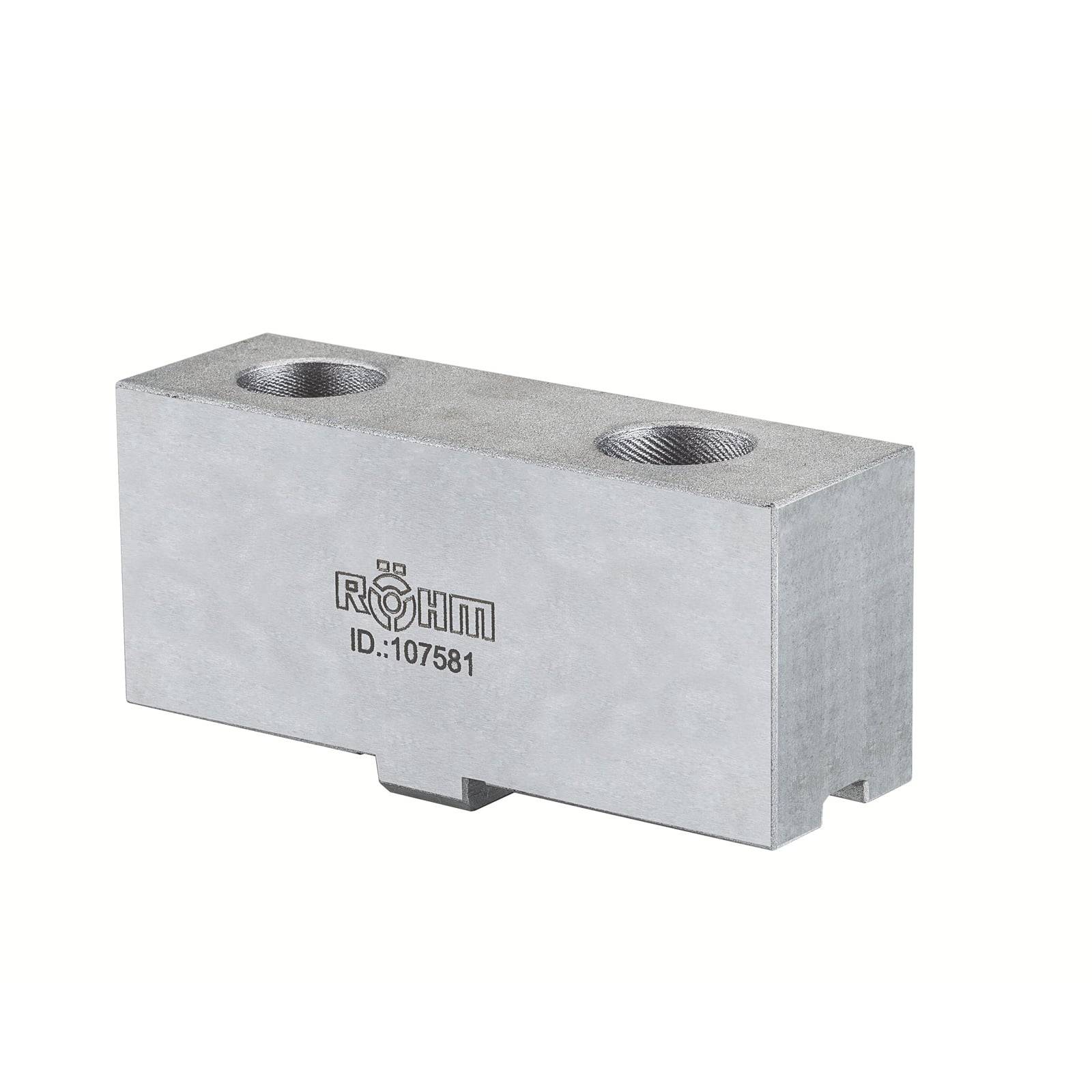 Ein rechteckiger Metallblock mit zwei Gewindebohrungen oben, mit der Bezeichnung „RÖHM ID:107581
