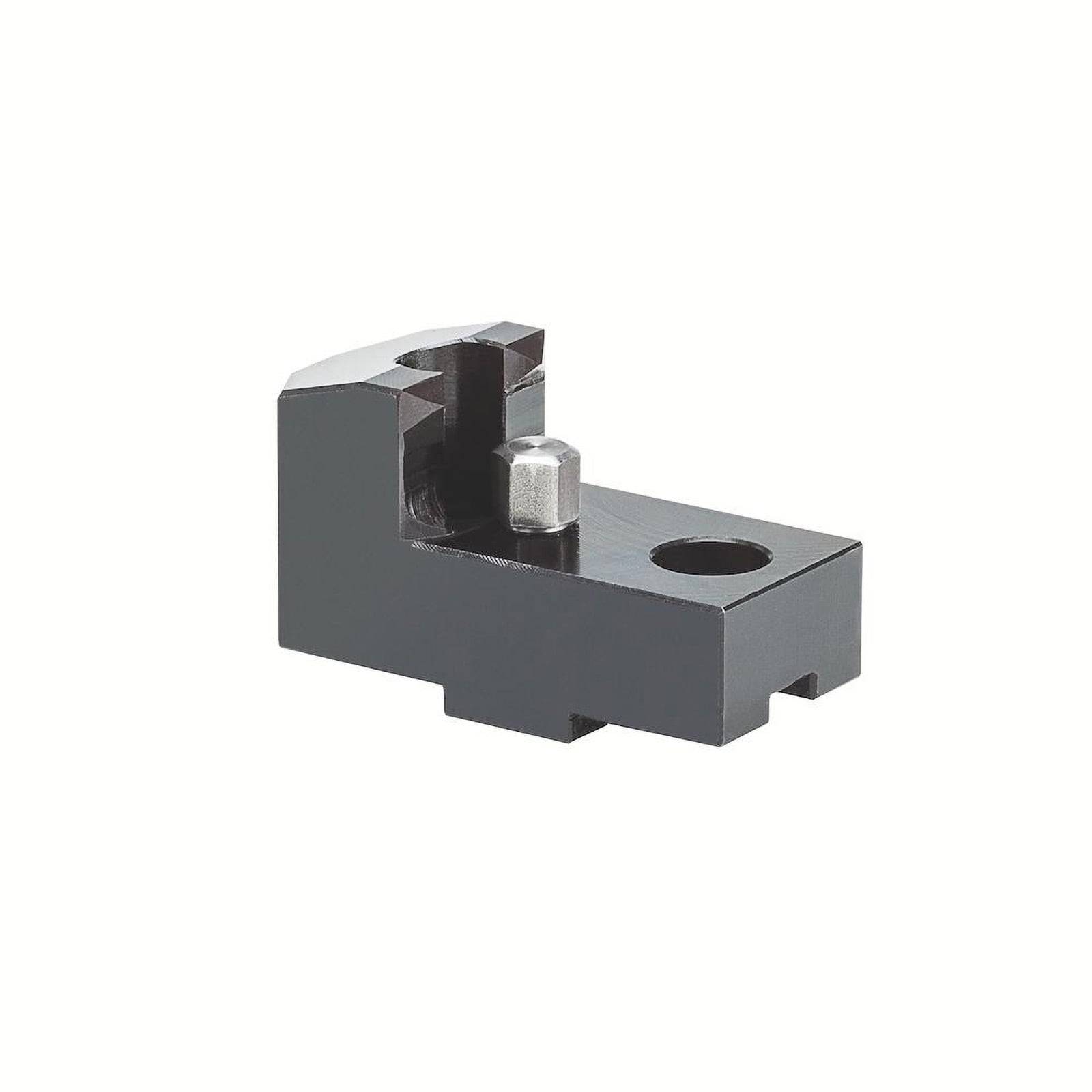 Eine schwarze Metallpräzisionswerkzeugkomponente mit einem zylindrischen Stift und Loch, die für mechanische Ausrichtungs- oder Montagezwecke verwendet wird.