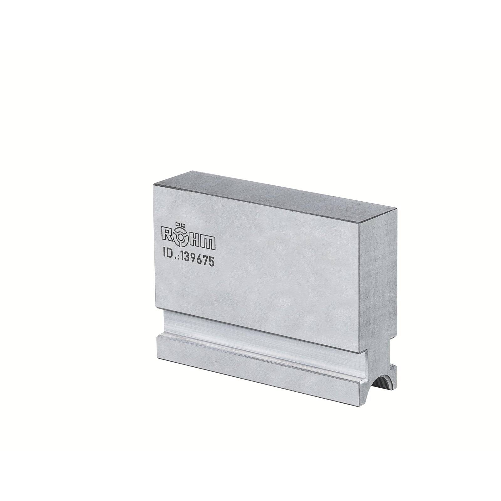 Metallischer Block mit eingravierter „RÖHM ID: 139675