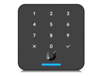 Ein Schwarzkarten-Lesegerät mit numerischer Tastatur mit den Zahlen 1-9, X, 0 und einem Häkchen. An der Unterseite befindet sich eine blaue Statusanzeige.