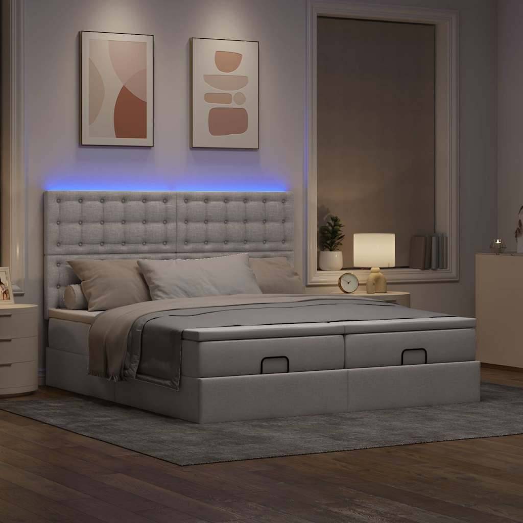 Ein modernes Schlafzimmer mit einem grau gepolsterten Bett unter abstrakter Kunst, beleuchtet von sanftem Ambient-Licht. Die Einrichtung umfasst einen Nachttisch und eine Lampe.