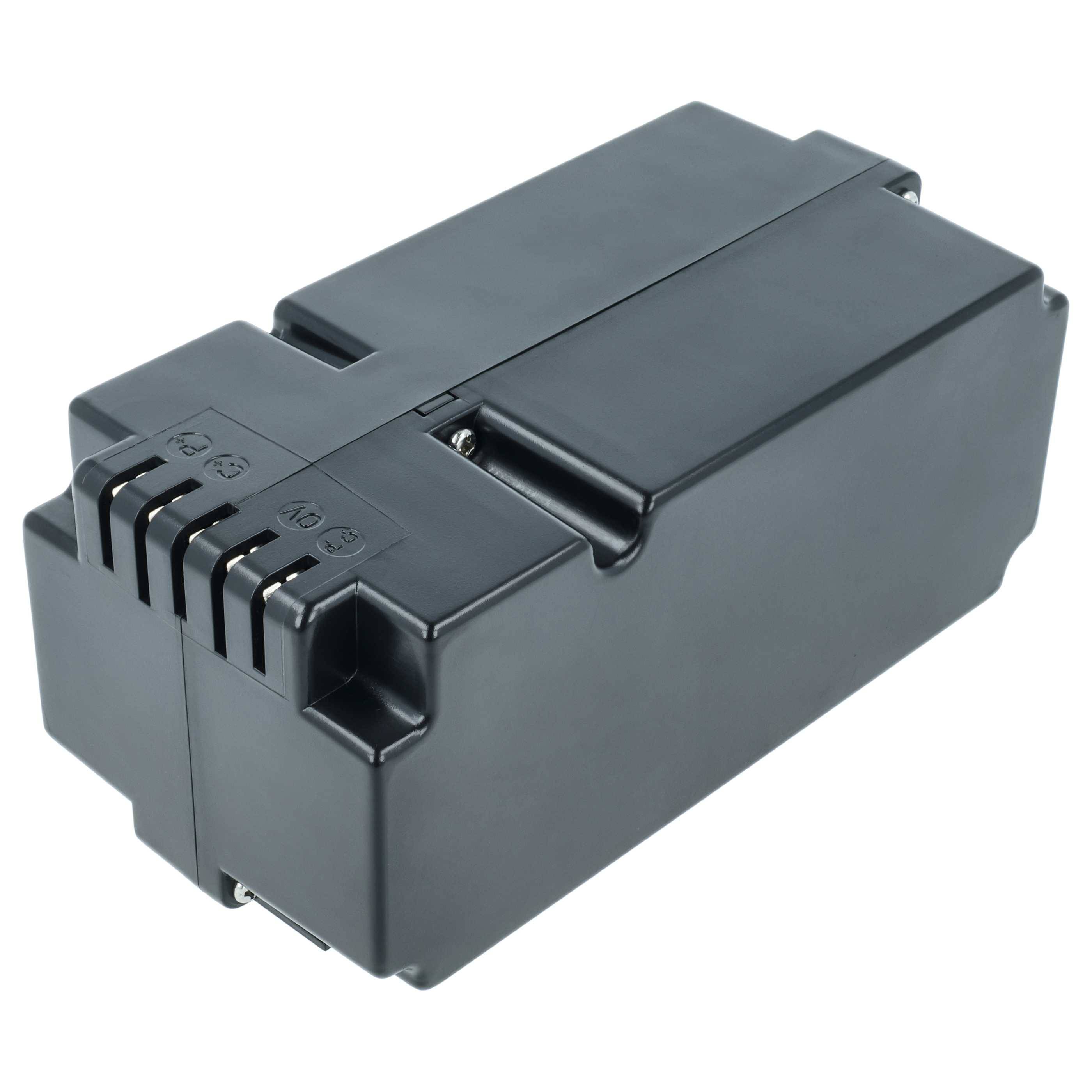 Eine schwarze, rechteckige elektrische Komponente mit Anschlüssen an der Oberseite, möglicherweise ein Netzteilmodul oder ein industrielles elektronisches Gerät.