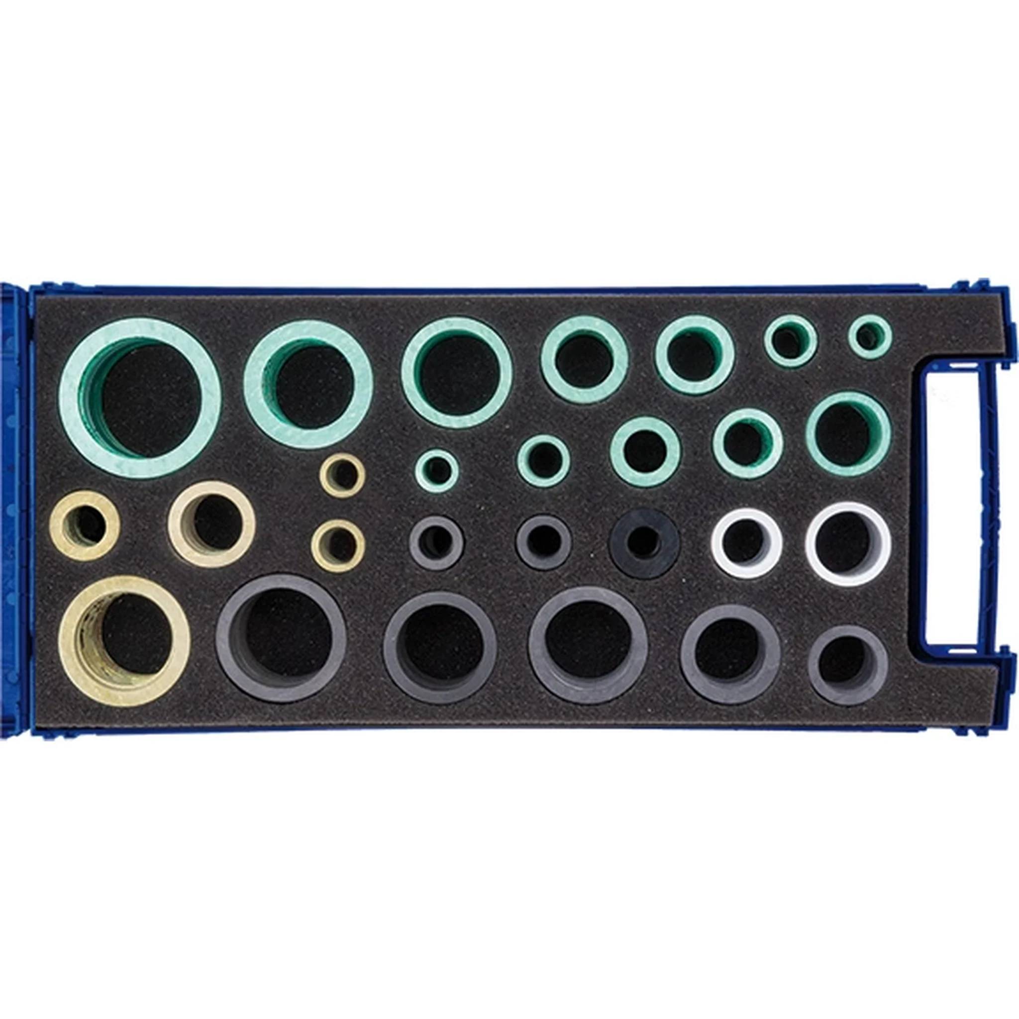 Farbcodierter Ringmessersatz mit mehreren kreisförmigen Löchern in einem blauen Etui, verwendet zum Messen oder Identifizieren von Größen.