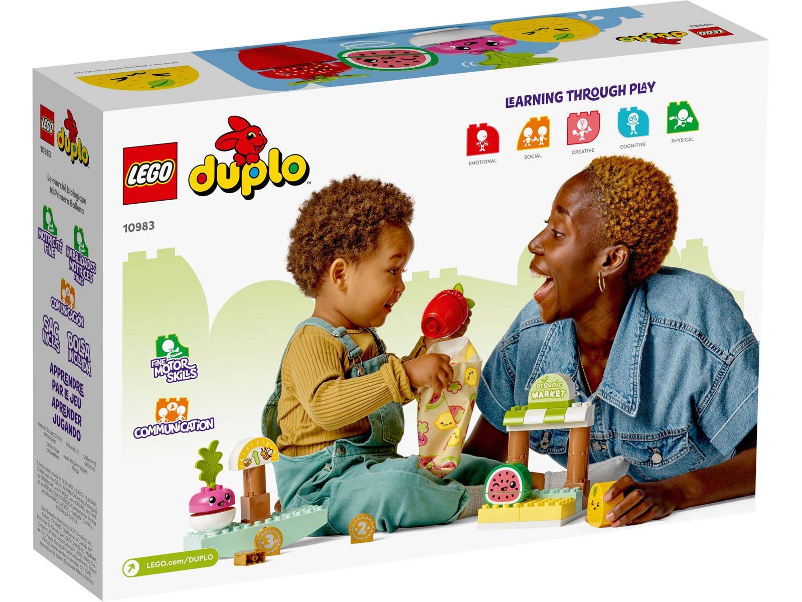 Ein Elternteil und ein Kind spielen mit LEGO Duplo. Die Verpackung hebt hervor: „Feinmotorik