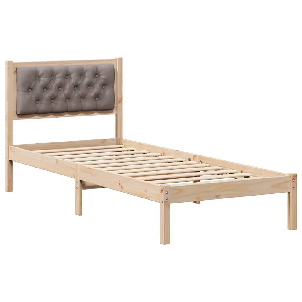 Ein Holz-Einzelbettgestell mit einem gepolsterten grauen Kopfteil, ausgestattet mit Holzlatten zur Matratzenunterstützung.