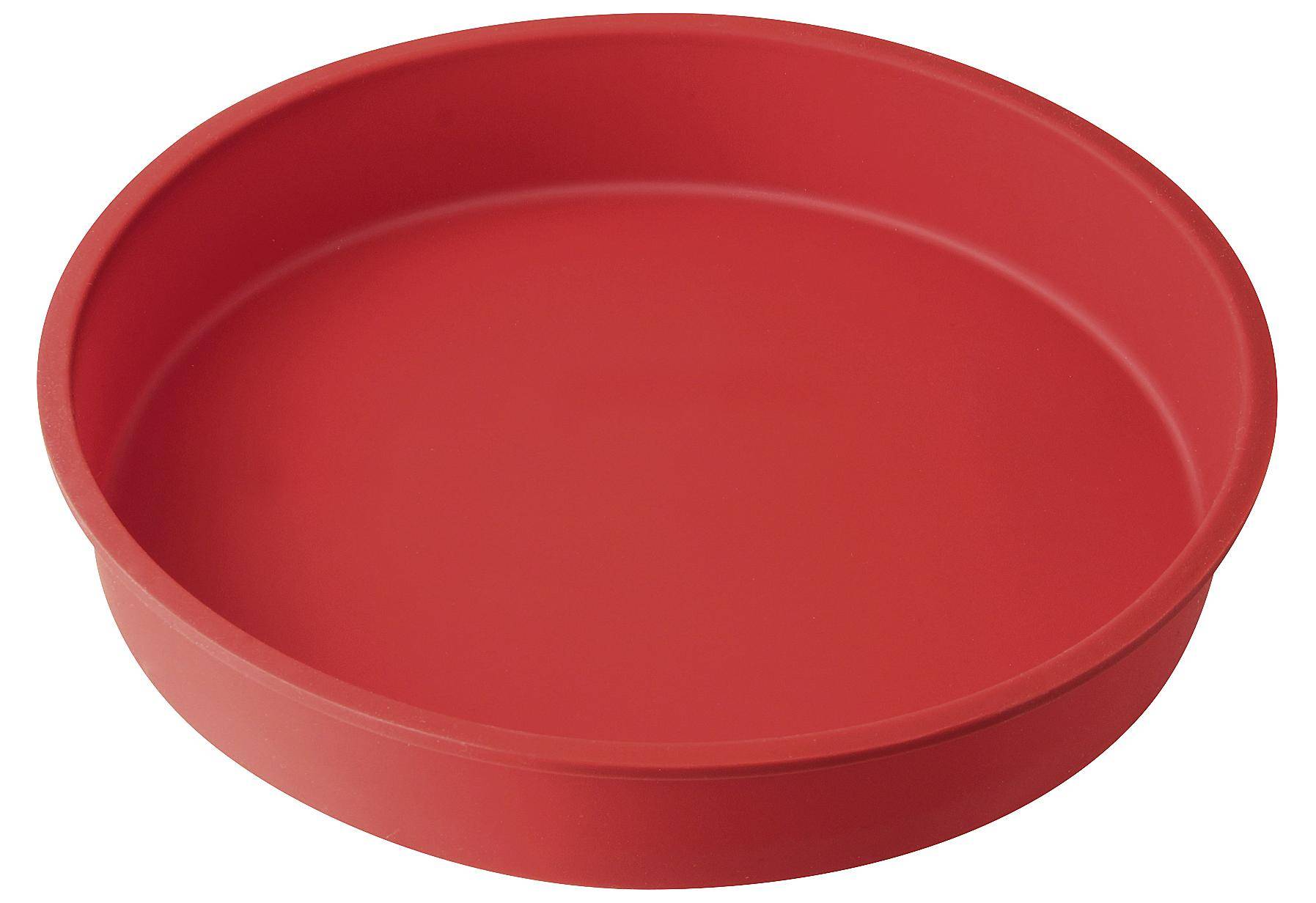 Eine runde, rote Silikonbackform mit erhöhtem Rand.